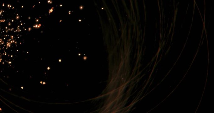 Dynamic metallic sparks dance on a black background. Perfect for motion graphics, visual effects, and creative projects
