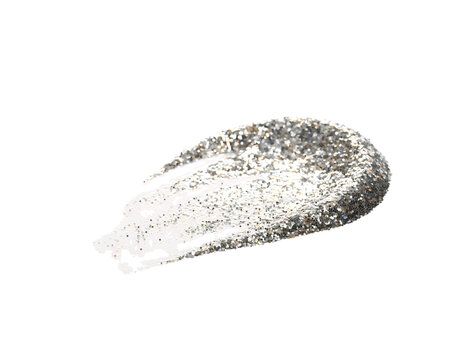 Sparkling silver glitter swatch, a shimmering cosmetic texture, vibrant metallic makeup pigment, and a dazzling festive decoration element. A radiant, luxurious