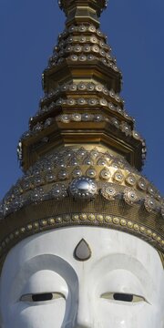 Head with crown of the highest of the five seated Buddhas (path to enlightenment), Buddhist temple complex Wat Phra That Sorn Kaew, Phetchabun province, Isan, Thailand