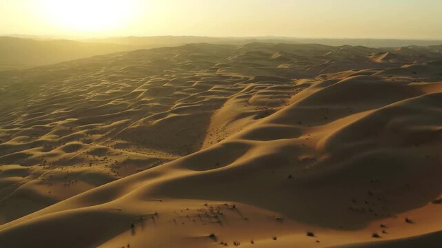 drone view Panoramic landscape of Erg Chebbi sand dunes located in Morocco on western edge Sahara Desert. Desert aerial footage. saudi panorama. uae Dubai. sandy. Nature sunset. Arab. dry barren land