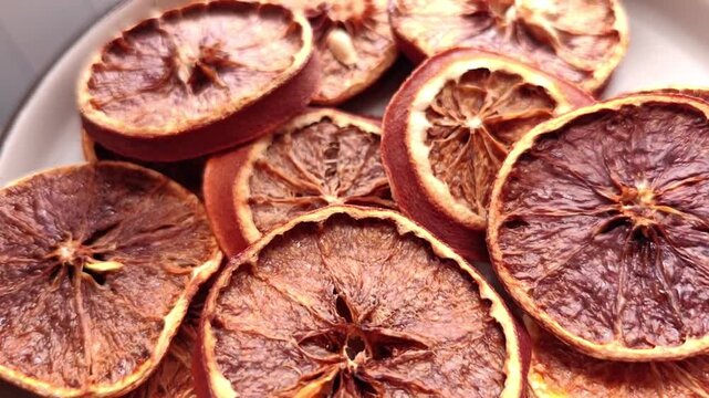 Macro close-up of dried orange slices with textured citrus pulp
