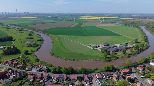 River Aire Meander and Airmyn Village Houses in UK Drone Flyover Shot