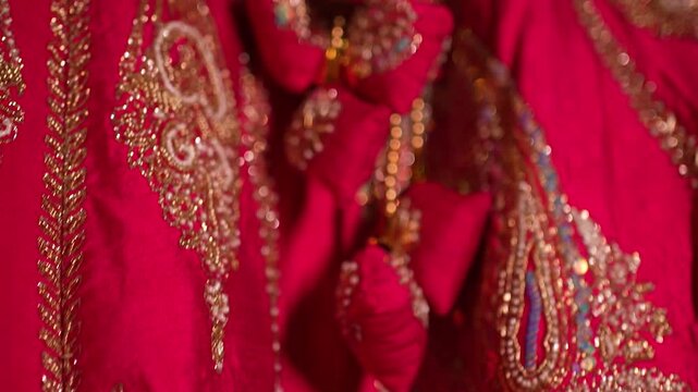 Traditional Indian wedding attire with gold embroidery in New Delhi India