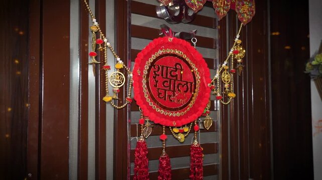 Traditional Indian wedding door decoration hanging in a home in New Delhi India
