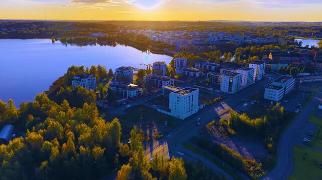 Evening sunset light over city H&auml;meenlinna in Finland, aerial drone view