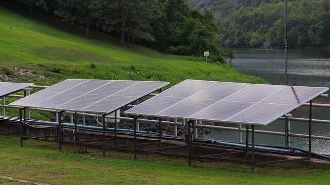 Small residential solar panels installed on a house roof for domestic renewable energy.