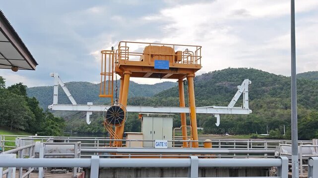 Control mechanism and steel gears of a dam floodgate system.