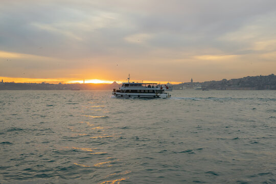 Bosphorus sunset cruise with a passenger ferry boat in Istanbul, Turkey