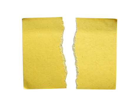 Blank yellow sticky note paper torn in half vertically with ragged edges, isolated on a black background.