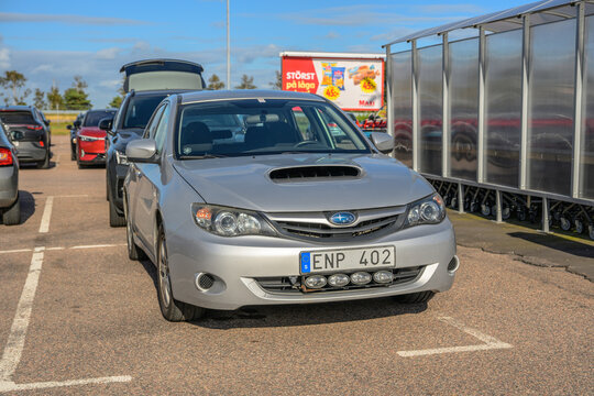 Mellbystrand, Sweden - August 06 2026: 2010 Subaru Impreza 2.0 TD parked outside Swedish supermarket.