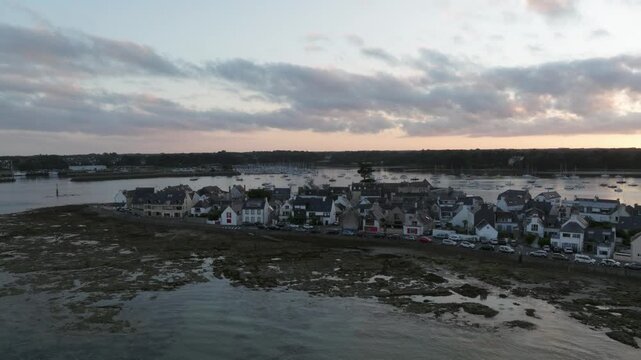 Aerial view along the shore of Ile Tudy at dusk
