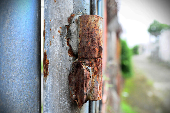 Rusty Metal Hinge on an Old Gate