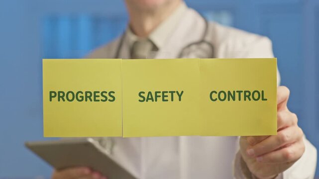 Medical professional with a stethoscope holding a tablet and showing sticky notes with the words progress, safety, and control, representing the balance of innovation and regulation in healthcare