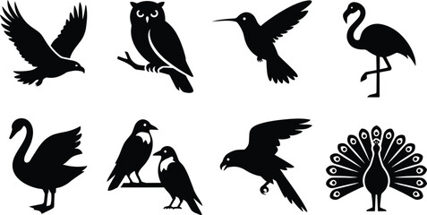 Fototapeta premium Black and white set of various birds, including owl, flamingo, peacock, swan, hummingbird, eagle, and crow silhouettes
