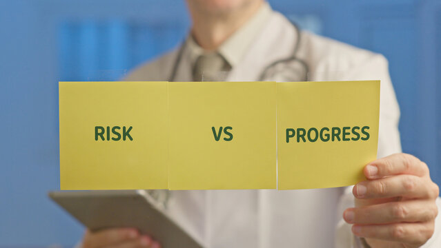 Doctor holding yellow paper labeled risk vs progress, highlighting the ethical dilemma of integrating ai into medicine and balancing innovation, patient safety, and future healthcare decisions