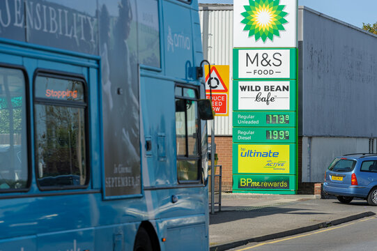 Arriva Bus Drives Past BP Sign Showing High Diesel Prices at 199.9p