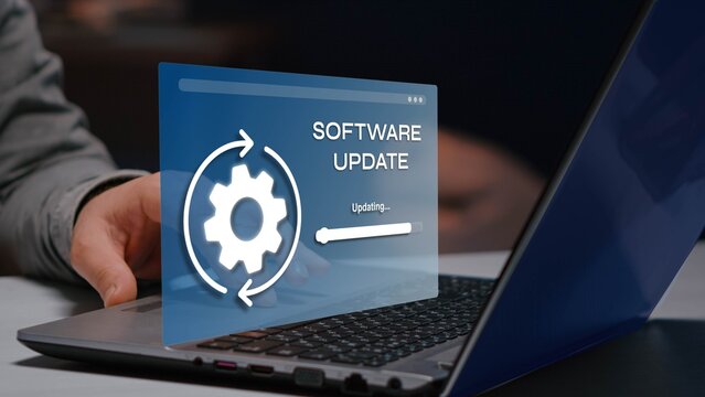 Software update, mouse cursor clicking on update, digital skills improvement, competitive advantage, continuous learning
