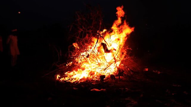 Holi is a Hindu festival in which a bonfire is lit to celebrate the burning of demoness this ritual is symbolic of victory of good over evil.