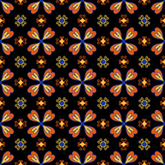 Vibrant ethnic seamless pattern bold tribal floral ornament background for modern textile fashion print graphic design © Natthita