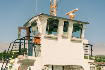 Wheelhouse of a river or coastal vessel with a marine radar antenna on the roof - 4 September 2026. © IBRESTER