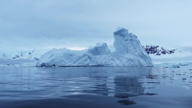 Antarctica Dramatic Iceberg Scenery with Amazing Shapes of Big Blue Icebergs, Massive Bizzare Beautiful Icebergs in Ocean Sea Water in Cold Winter Seascape Landscape on Antarctic Peninsula