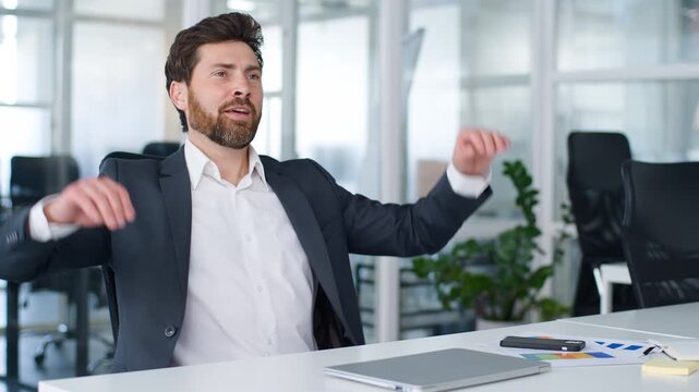 Successful Caucasian middle-aged business man finish work stop using laptop enjoying break at chair leaning back holding hands behind head satisfied mature businessman male finishing working in office
