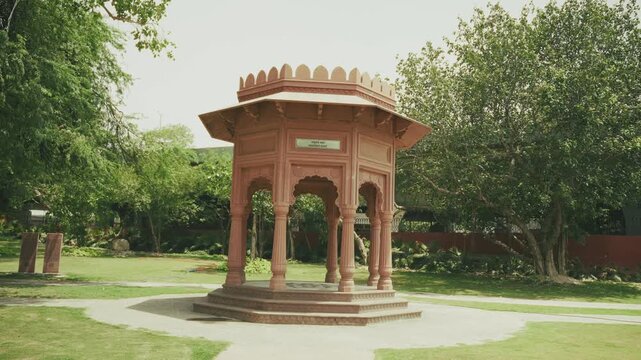Cinematic video of Vasudev Ghat along the Yamuna River in Delhi, featuring riverside steps, landscaped gardens, traditional architectural elements, and peaceful surroundings. A scenic Delhi tourism.