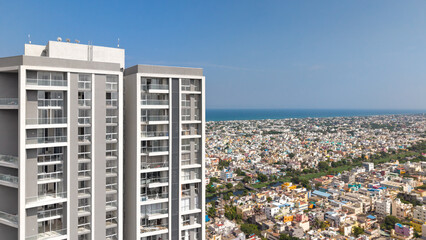 High rise residential towers overlooking the city and the sea aerial coastal cityscape © VisualTreat12