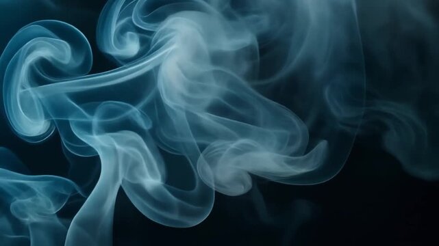 Ethereal wisps of translucent blue smoke gracefully swirl and dance across the dark canvas, creating an atmospheric and captivating visual composition perfect for diverse creative projects