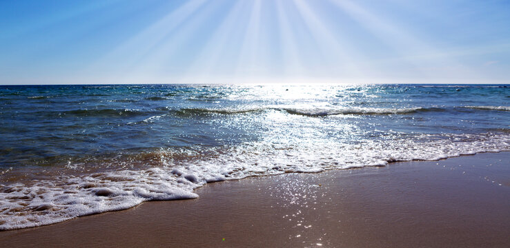 Sun beach with blue sky and turquoise water,as holiday summer background.