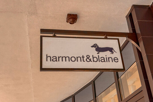 15.09.2026,Porto Montenegro.Harmont & Blaine store signage featuring the signature dachshund logo on the boutique's facade in Porto Montenegro, Tivat.