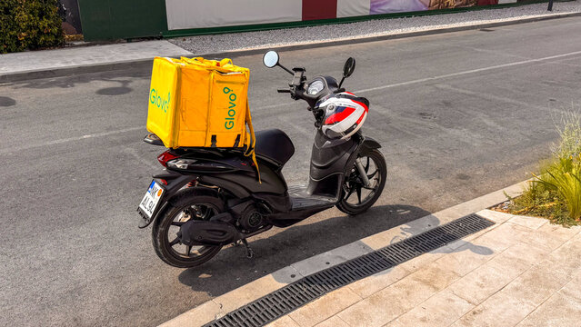 15.09.2026,Porto Montenegro.Glovo Delivery Scooter Parked in Porto Montenegro
