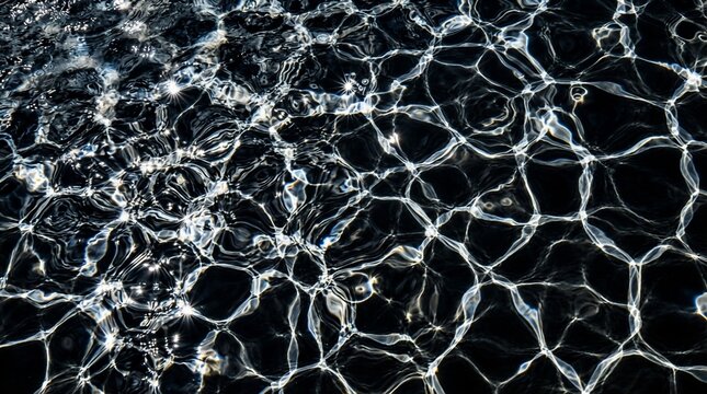 Abstract caustic light patterns shimmering on dark water surface with organic ripple textures and sparkling white highlights background
