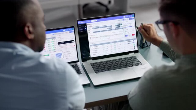 Data Engineer And Colleague Monitor Real-time Workflow Automation