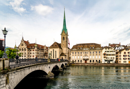 Historic European Cityscape with River and Church