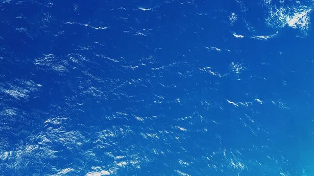 Aerial View of Deep Blue Ocean Waves