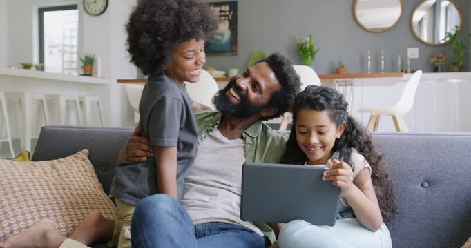 Family, dad and children with tablet in lounge, laughing and streaming movie with app subscription. Online, entertainment and African man with smile, father and kids with tech for funny film in house
