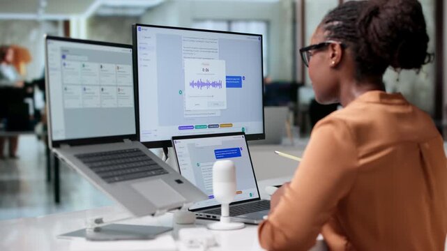 Customer Support Agent Types Quickly On Laptop