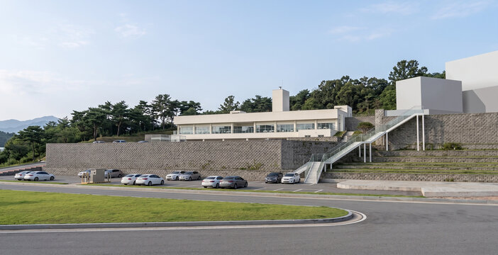 3d architectural rendering of a modern educational facility in the park
