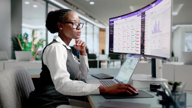 Association Manager Updates Member Database Using Laptop