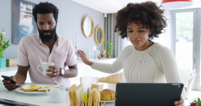Couple, tablet and smile with breakfast in kitchen for social media, show internet post or morning. Happy black people, tech or share in home for funny joke, online comedy or streaming service on app