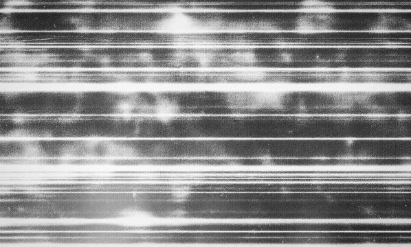 Vintage VHS glitch texture with analog static noise. Retro television screen distortion and horizontal signal interference. Grungy black and white video overlay for cinematic film transitions.