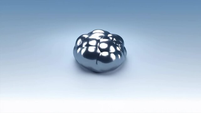 Reflective silver spheres roll inward and merge from a scattered pile into one smooth liquid-like blob on pale blue surface, with bright highlights and centered close view