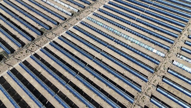 aerial view of solar thermal power station with parabolic trough collectors