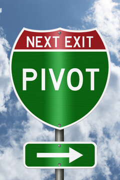 Pivot Next Exit with arrow on an American interstate road sign with sky for next steps