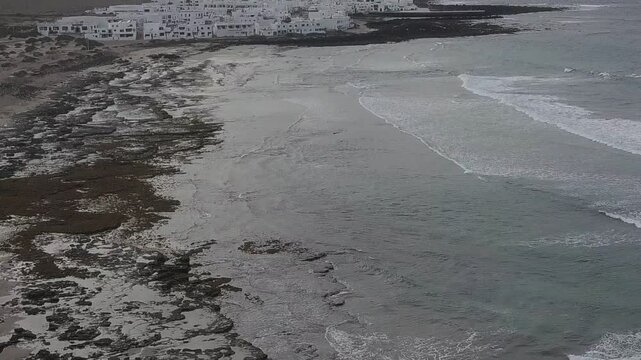 Rocky shoreline and coastal village