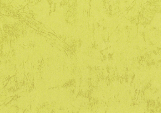 Distressed yellow paper lets rubbed streaks interrupt the blank field around journal cover text, combining irregular darker patches and grain in a grunge texture for scrapbook backgrounds