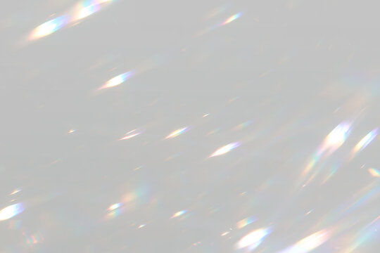 Iridescent light particles with crystal reflections and abstract highlights.