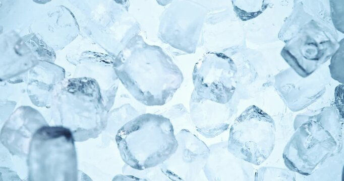 Super slow motion of falling ice cubes separated on black background. Filmed on high speed cinema camera, 1000 fps.