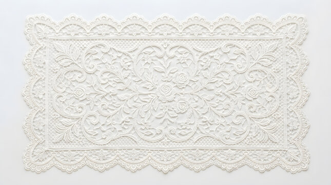 Delicate White Lace Doily: An exquisite rectangular white lace doily with intricate floral patterns and a scalloped edge, showcasing fine craftsmanship and timeless elegance.